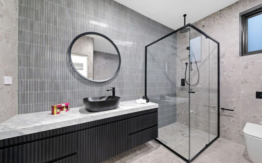Modern Australian bathroom design trends for 2026 with walk-in shower and timber vanity
