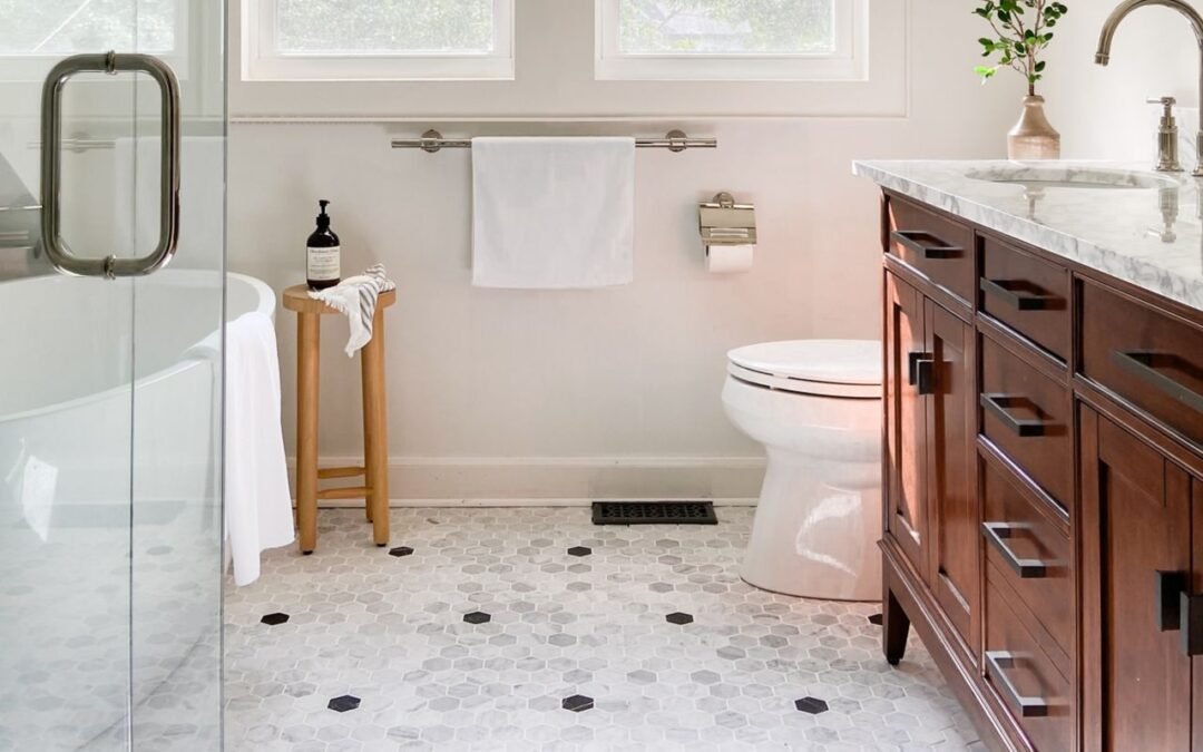 Using the three four five rule to check square corners before tiling a bathroom floor