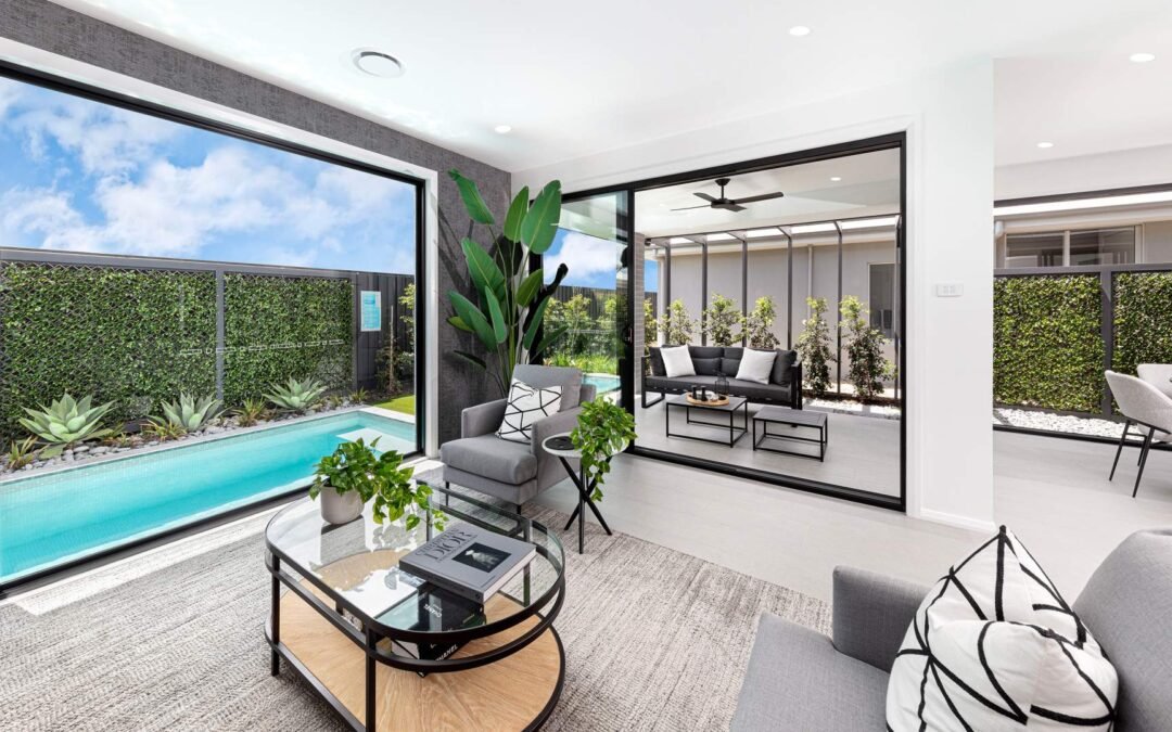Sydney home renovation showing open-plan kitchen and alfresco area that adds $100k in property value