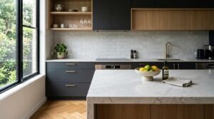 Modern Sydney kitchen renovation with marble waterfall island, timber cabinetry, and contemporary white tile splashback