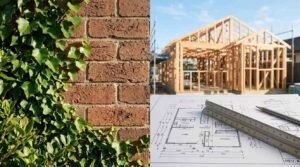 Brick wall with climbing ivy beside house framing and architectural floor plans