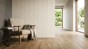 Modern interior featuring wood-look flooring, a herringbone tile accent wall, and a cozy lounge chair beside large windows