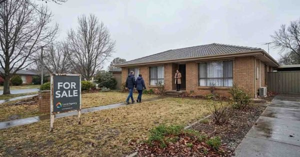 Australian house for sale during winter with quiet inspection and subdued real estate market atmosphere