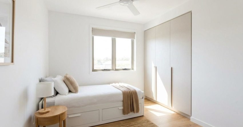 Compact Australian bedroom with efficient layout natural light and functional storage meeting minimum size requirements