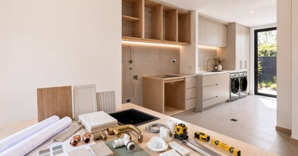 Premium Australian laundry renovation with organized cabinetry, flooring, plumbing, fixtures, and completed storage illustrating a comprehensive renovation planning checklist.