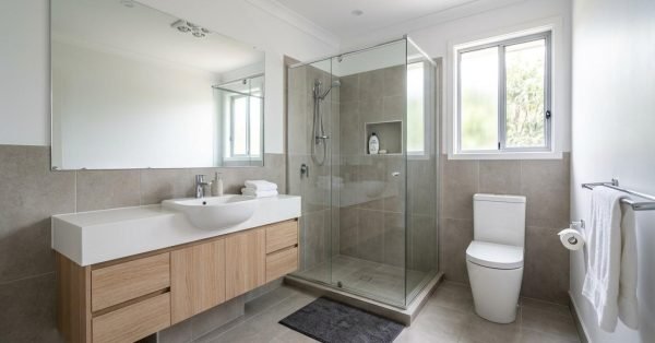 Modern Australian home featuring a renovated kitchen, bathroom, laundry, and living space representing a complete home renovation and the costs involved in achieving premium residential finishes.