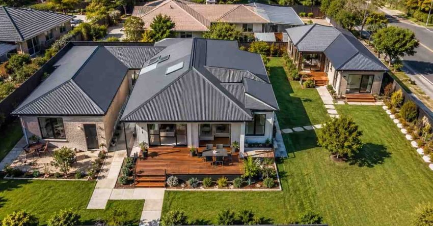 Aerial view of a suburban property comparing an attached granny flat connected to the main house and a detached granny flat located separately in the backyard, highlighting different residential layouts and building styles.